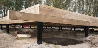 Реконструкция фундамента деревянного дома винтовыми сваями: этапы и особенности Реконструкция фундамента деревянного дома винтовыми сваями: этапы и особенности
